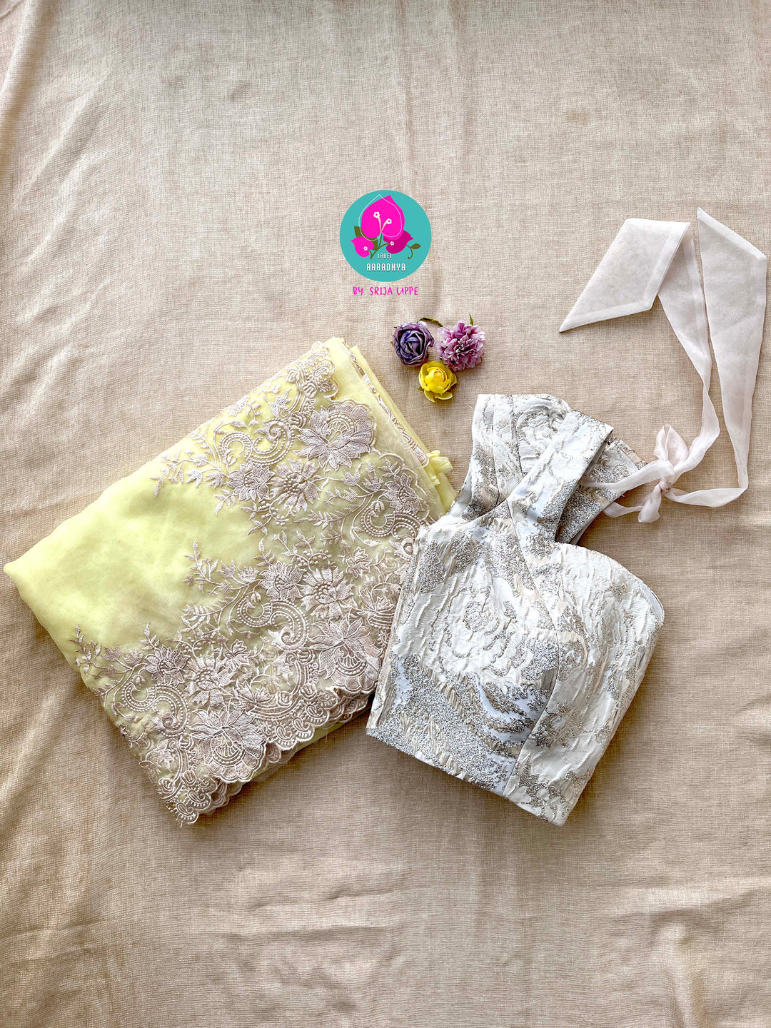Pastel Yellow Embroidered Organza Saree with Imported fashion Fabric blouse