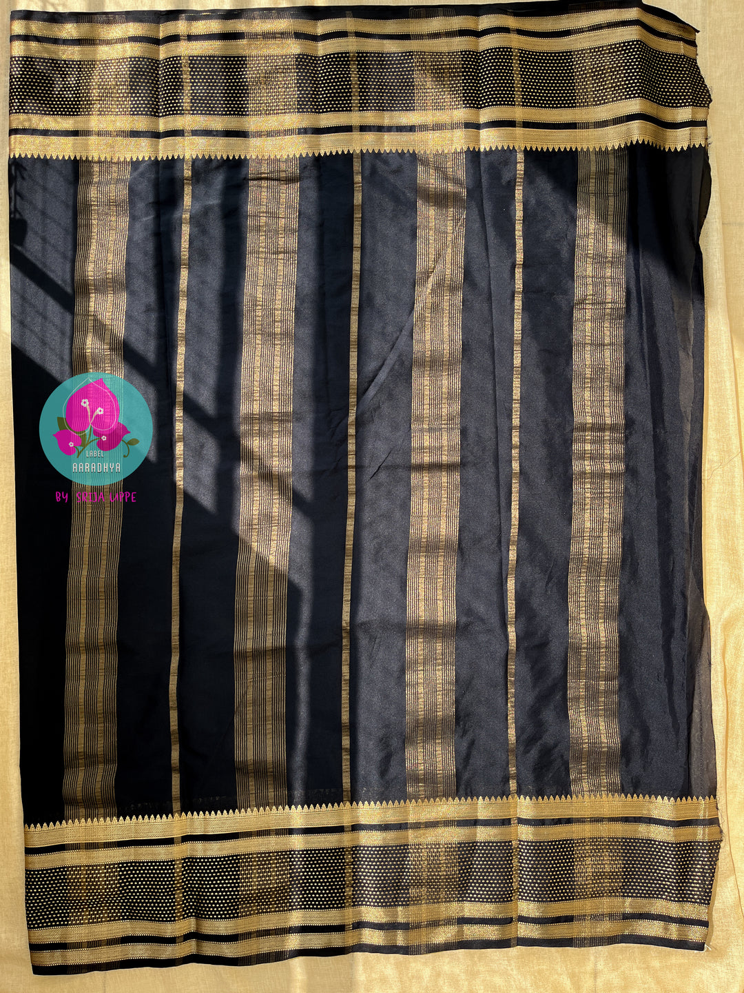 Black Semi Crape Silk Saree with zari border