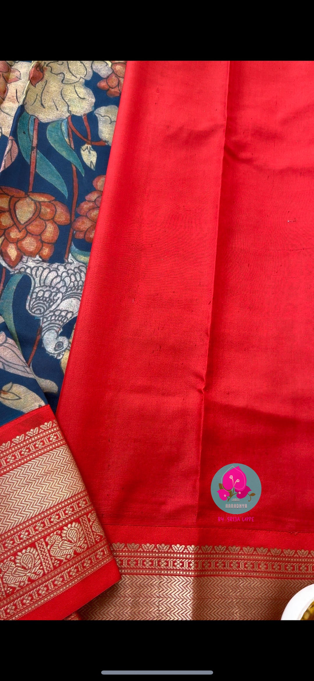 Blue kalamkari printed saree with red border