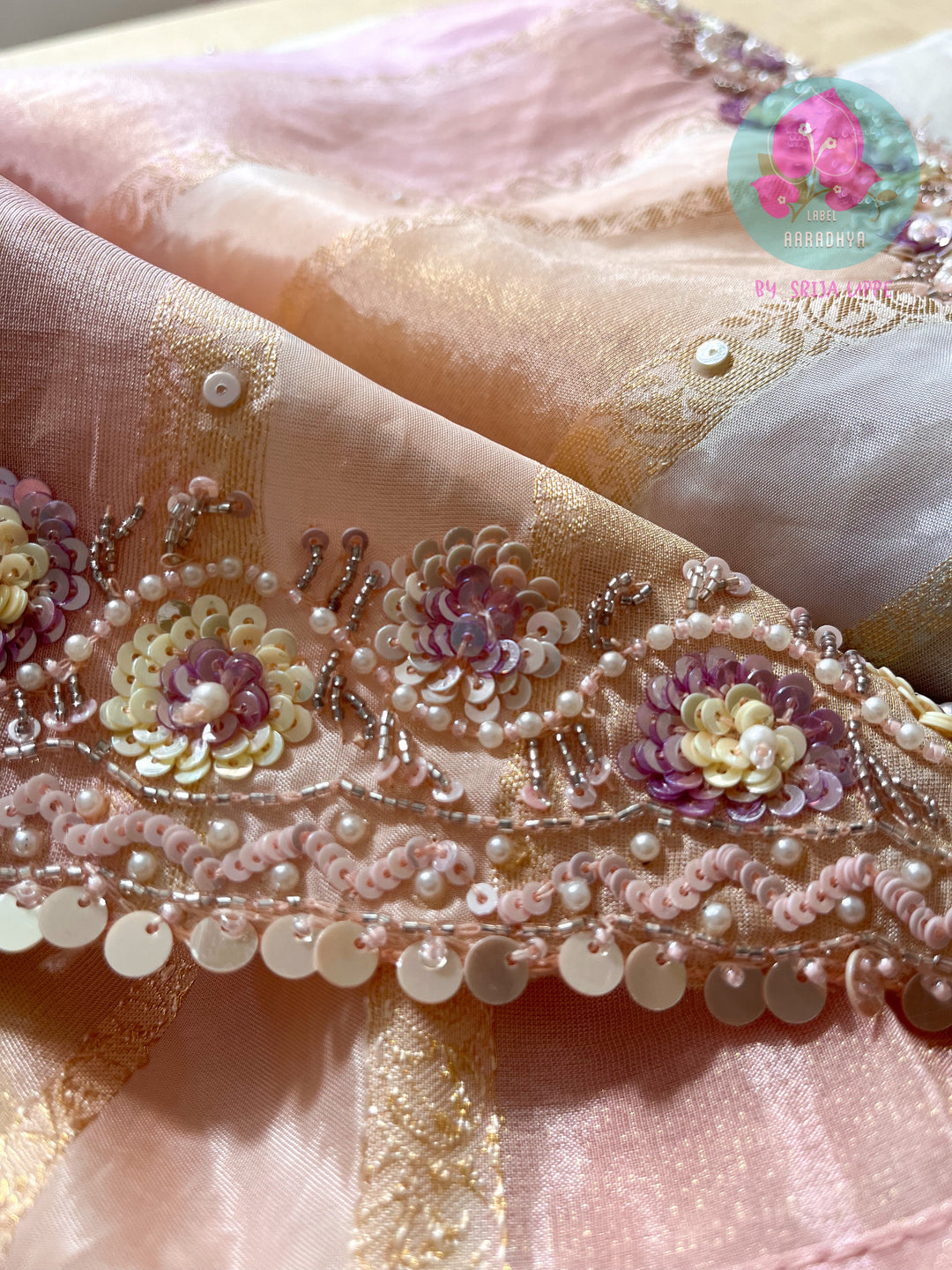 Multi-shaded tissue hand embroidered georgette saree