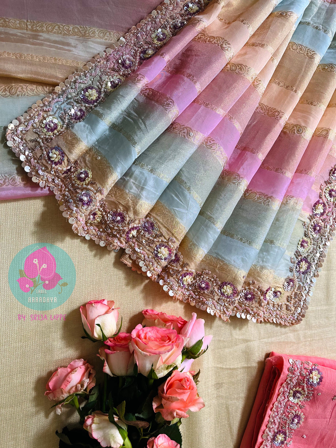 Multi-shaded tissue hand embroidered georgette saree