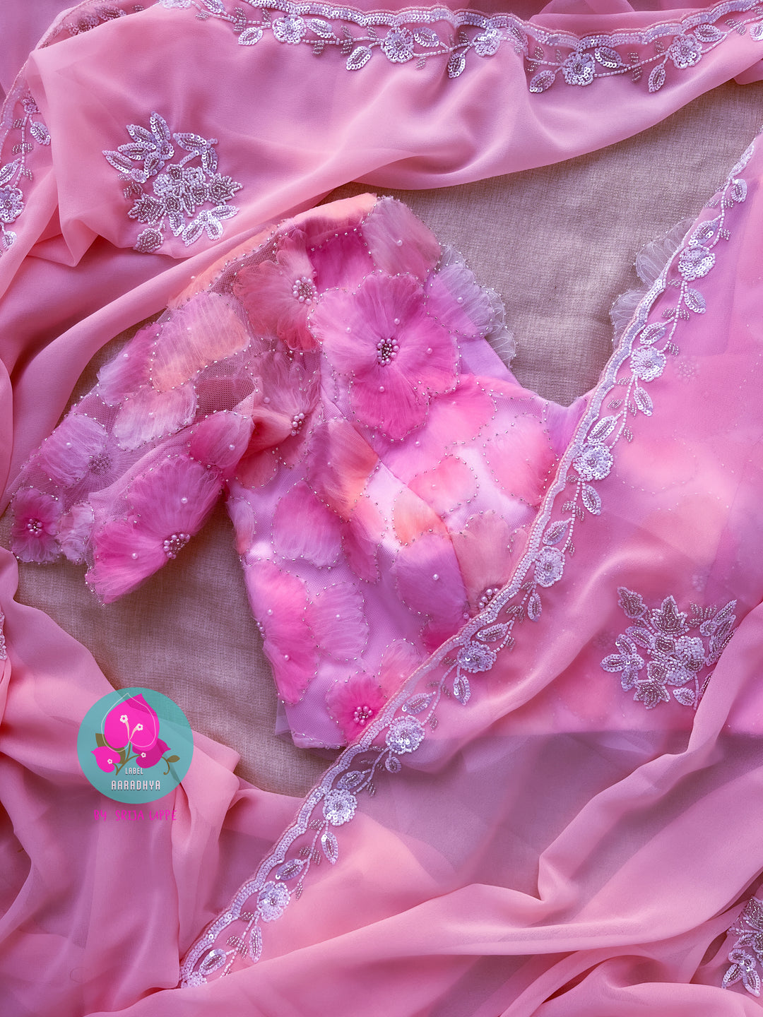 Hand embroidered georgette Pink saree with Embellished Net Fashion Blouse