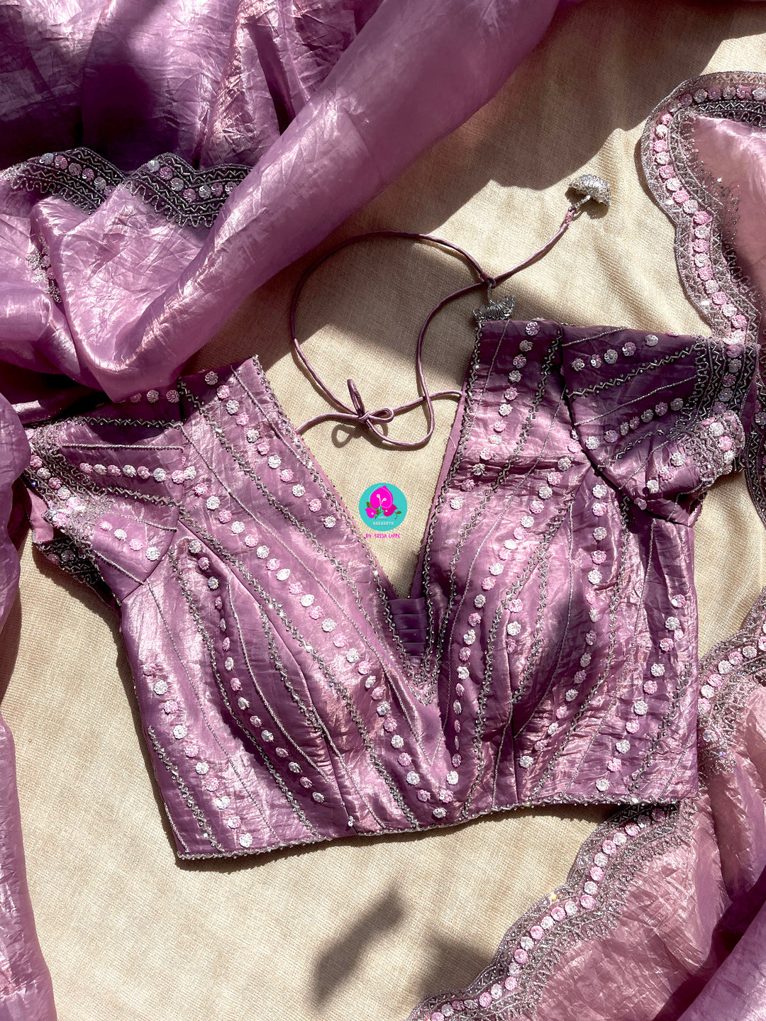 Crushed satin silk saree with sequins embroidery paired with Crushed satin sequins blouse