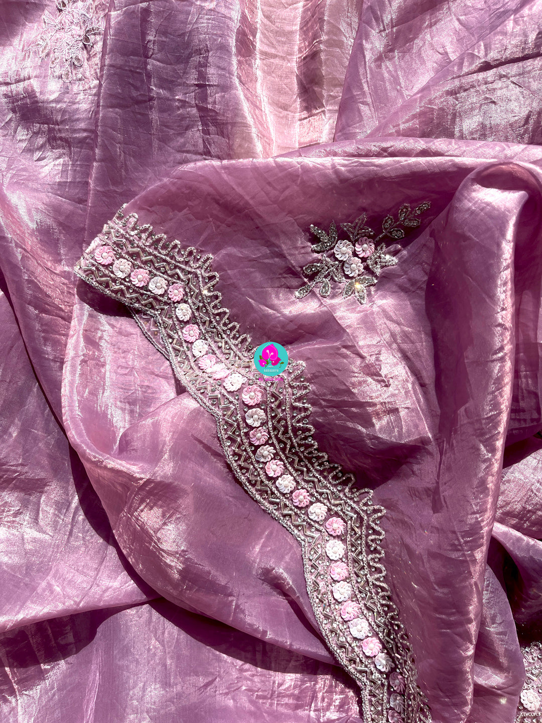 Crushed satin silk saree with sequins embroidery paired with Crushed satin sequins blouse