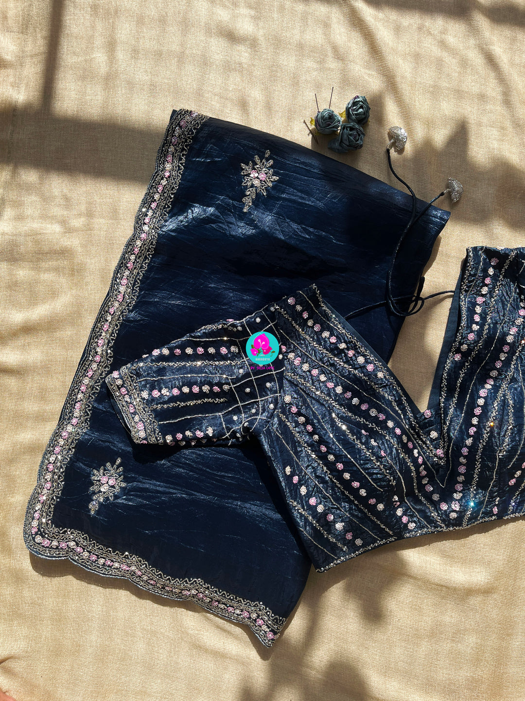 Crushed satin silk saree with sequins embroidery paired with Crushed satin sequins blouse