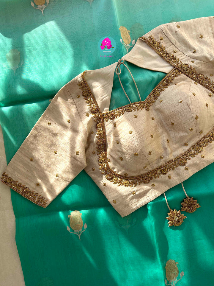 Pure Benarasi Kora organza saree with hand embroidered pure rawsilk blouse in Madhubala pattern.