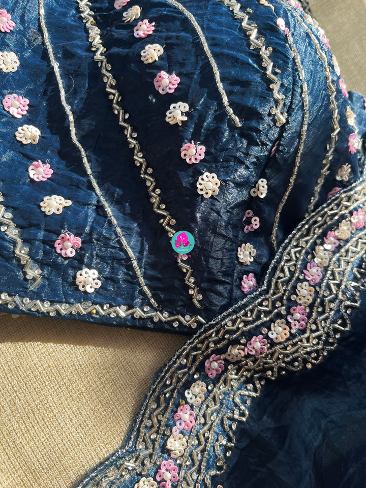 Crushed satin silk saree with sequins embroidery paired with Crushed satin sequins blouse