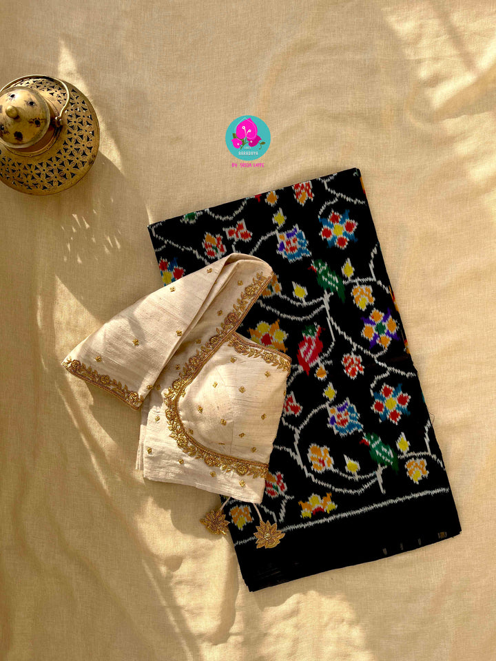 Pure Ikkat Patola Saree with hand embroidered Pure Rawsilk blouse