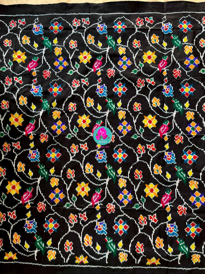 Pure Ikkat Patola Saree with hand embroidered Pure Rawsilk blouse