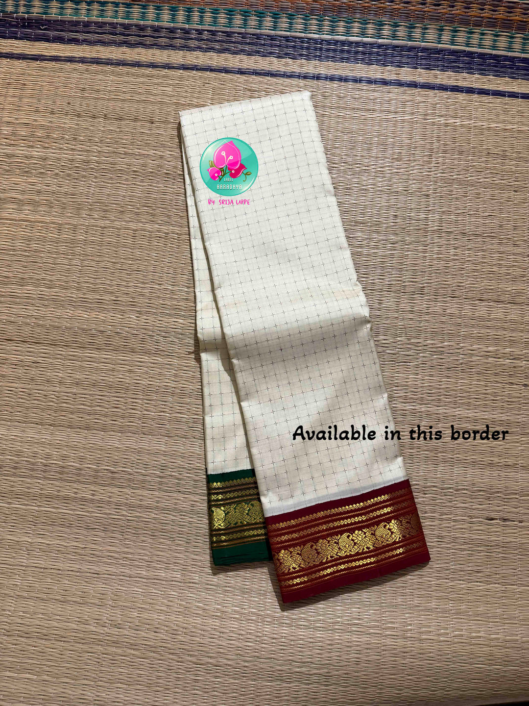 The Blessed Drape: Off-White Pure Kanchipattu Thalambralu Saree with Dual-Tone Pallu