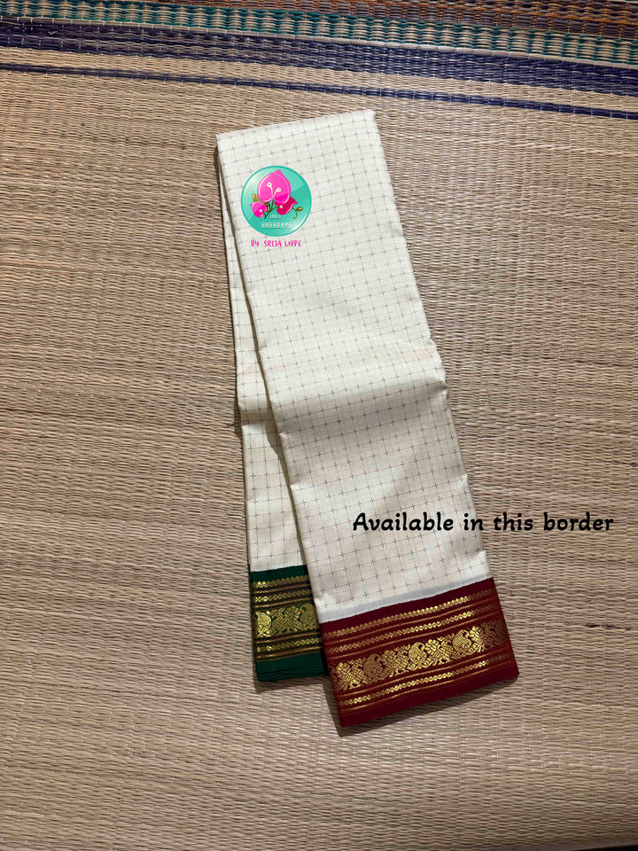 The Blessed Drape: Off-White Pure Kanchipattu Thalambralu Saree with Dual-Tone Pallu