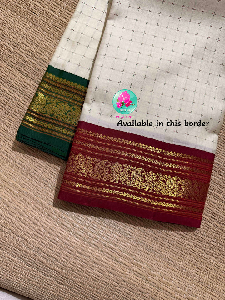 The Blessed Drape: Off-White Pure Kanchipattu Thalambralu Saree with Dual-Tone Pallu