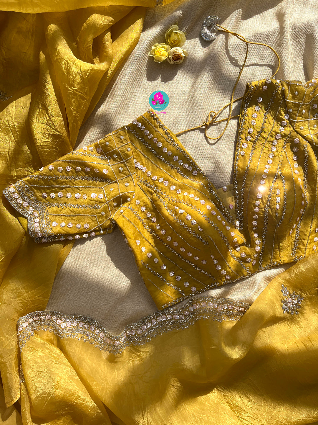 Crushed satin silk saree with sequins embroidery paired with Crushed satin sequins blouse