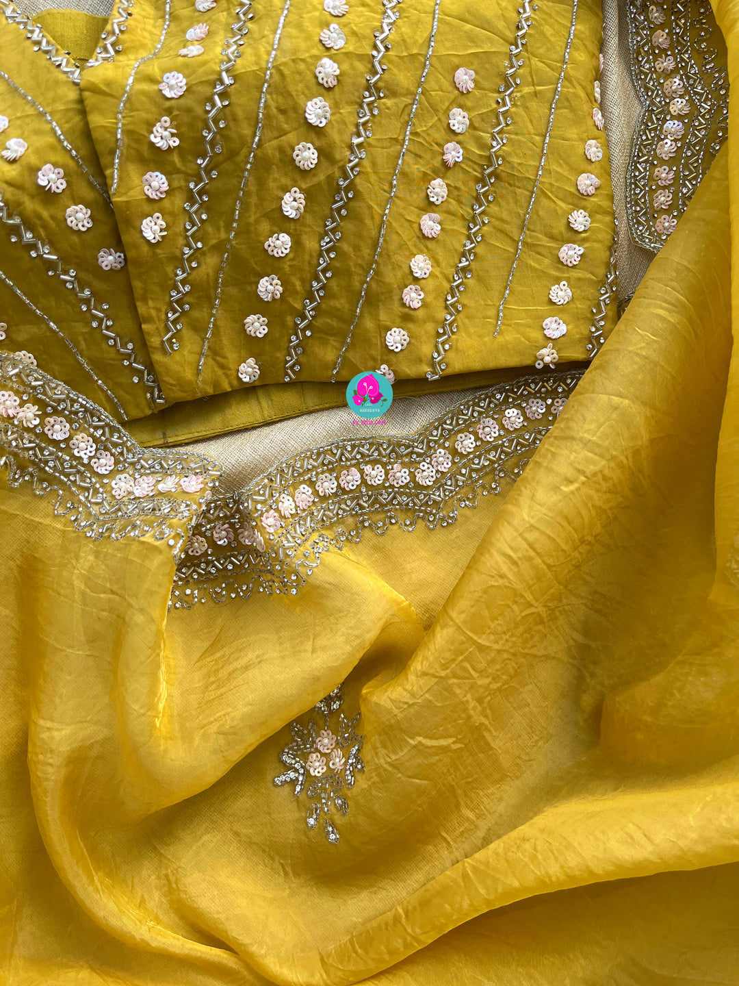 Crushed satin silk saree with sequins embroidery paired with Crushed satin sequins blouse