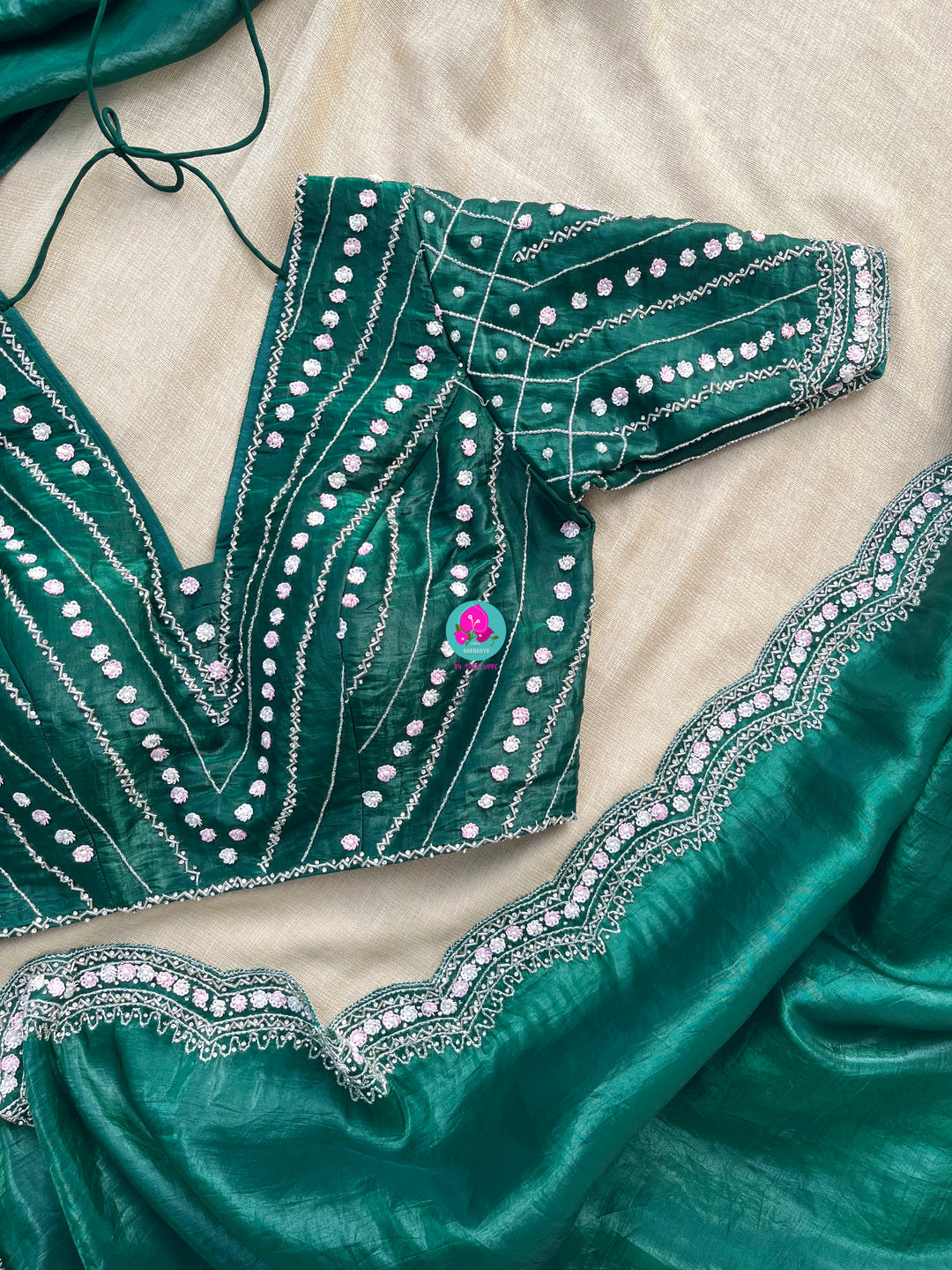 Crushed satin silk saree with sequins embroidery paired with Crushed satin sequins blouse
