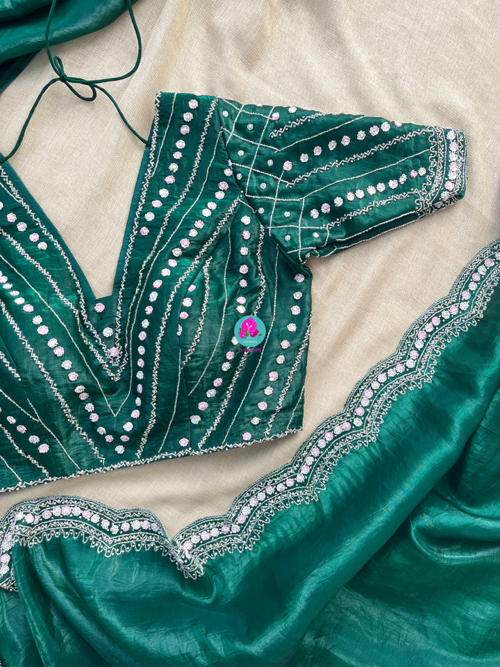Crushed satin silk saree with sequins embroidery paired with Crushed satin sequins blouse
