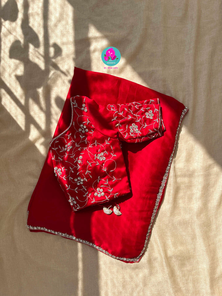 The Passionate Drape: Lustrous Red Satin with Shimmering Silver Work