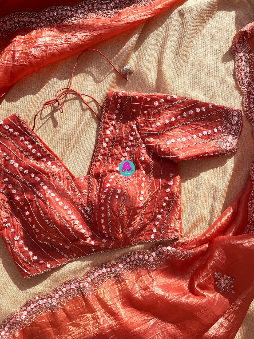 Crushed satin silk saree with sequins embroidery paired with Crushed satin sequins blouse