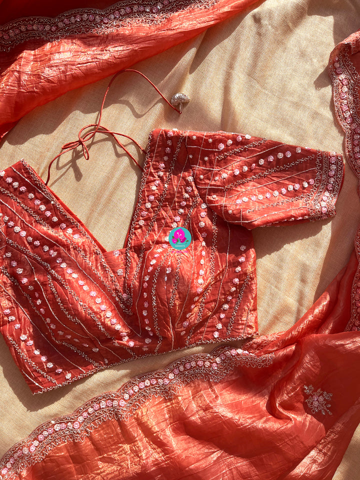 Crushed satin silk saree with sequins embroidery paired with Crushed satin sequins blouse