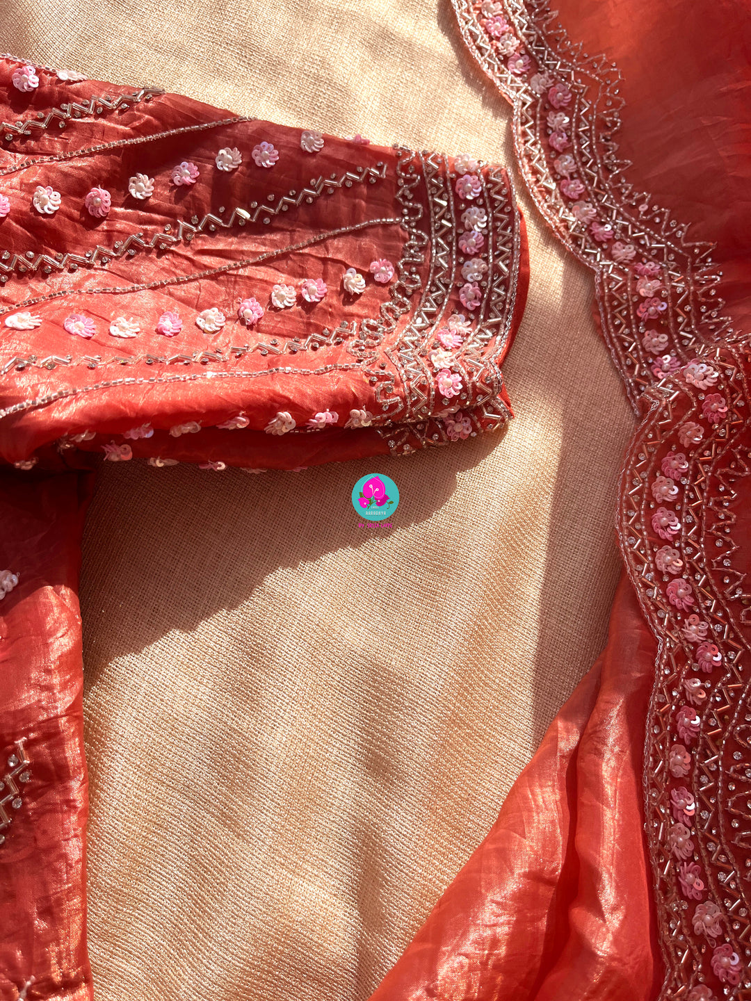Crushed satin silk saree with sequins embroidery paired with Crushed satin sequins blouse