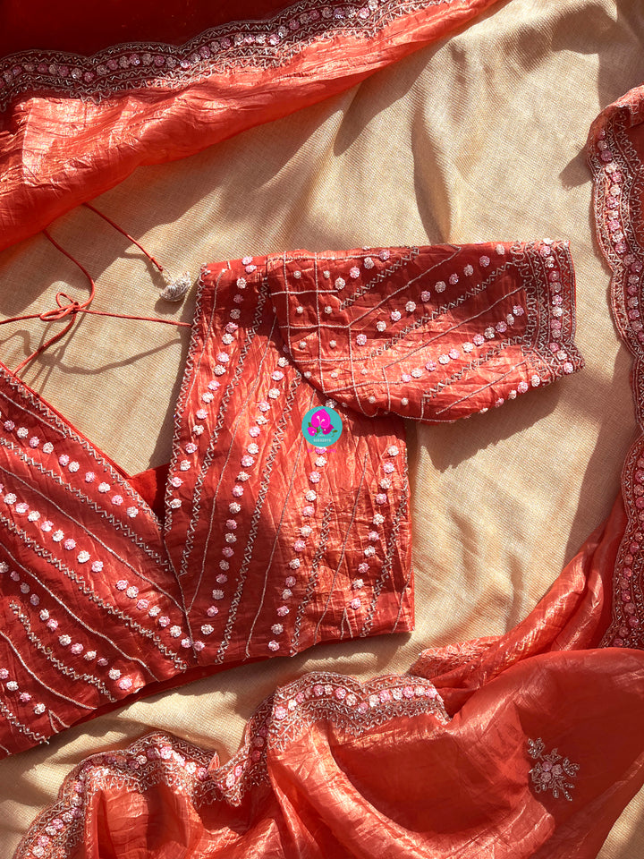 Crushed satin silk saree with sequins embroidery paired with Crushed satin sequins blouse