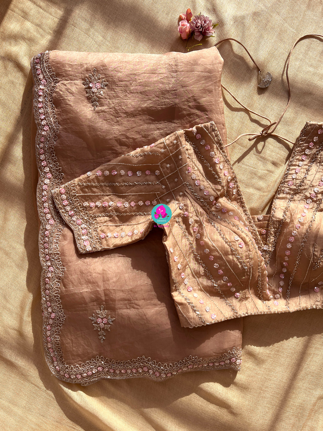 Crushed satin silk saree with sequins embroidery paired with Crushed satin sequins blouse