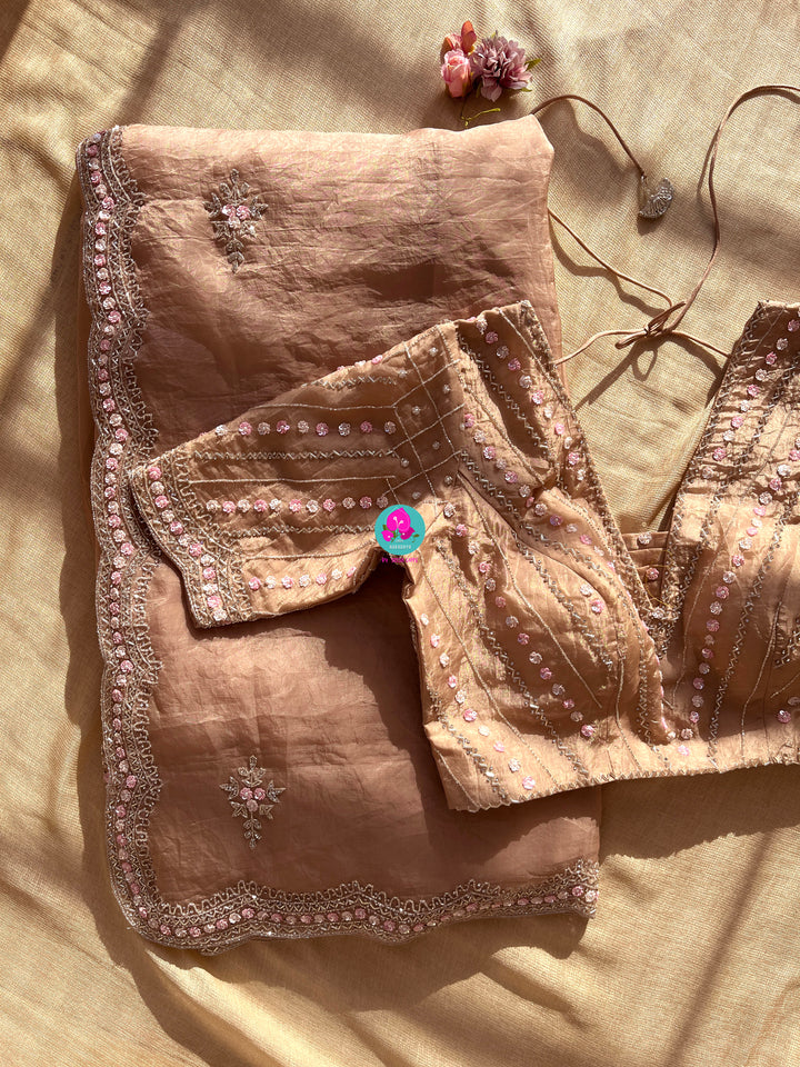 Crushed satin silk saree with sequins embroidery paired with Crushed satin sequins blouse