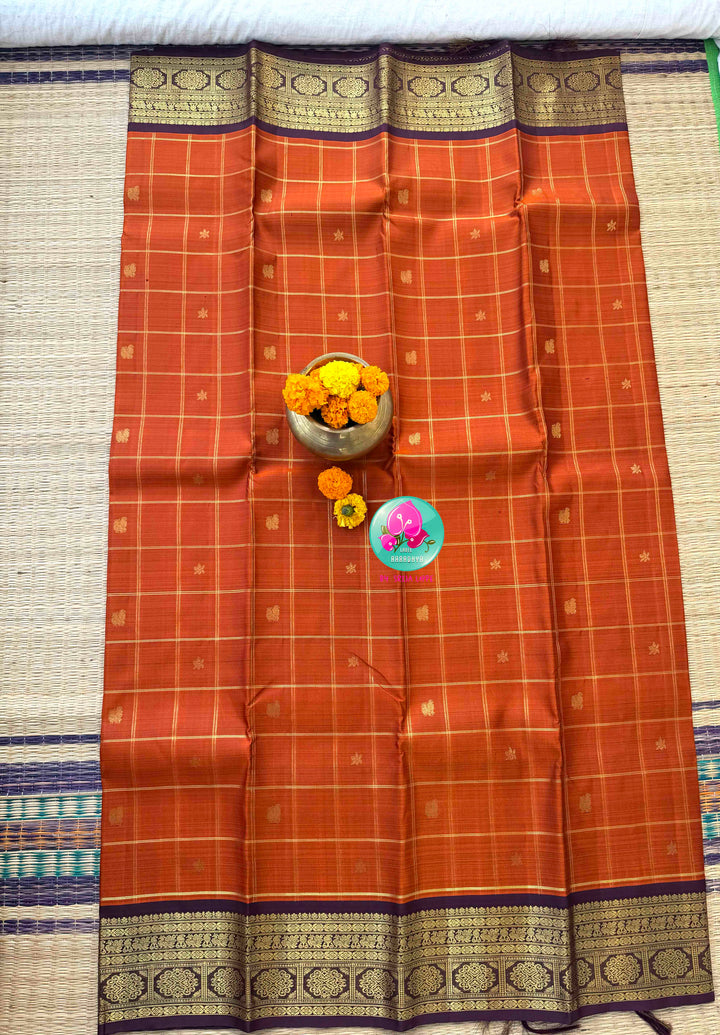 Vintage Earth Elegance: Rust Orange Checkered Kanchipattu Saree with Chocolate Brown Accents