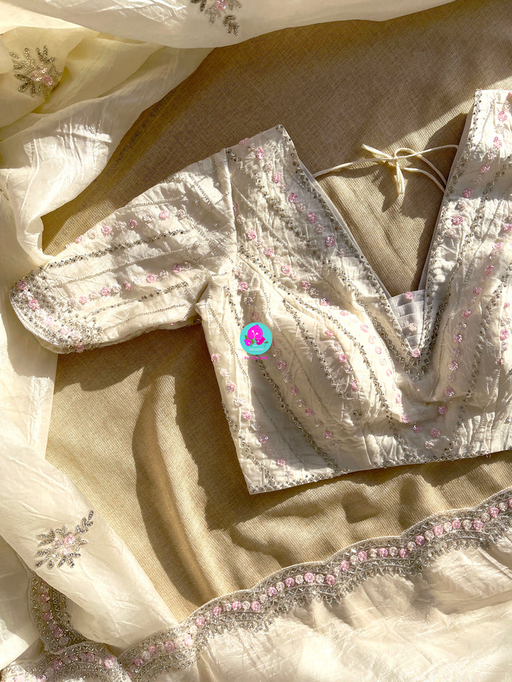 Crushed satin silk saree with sequins embroidery paired with Crushed satin sequins blouse