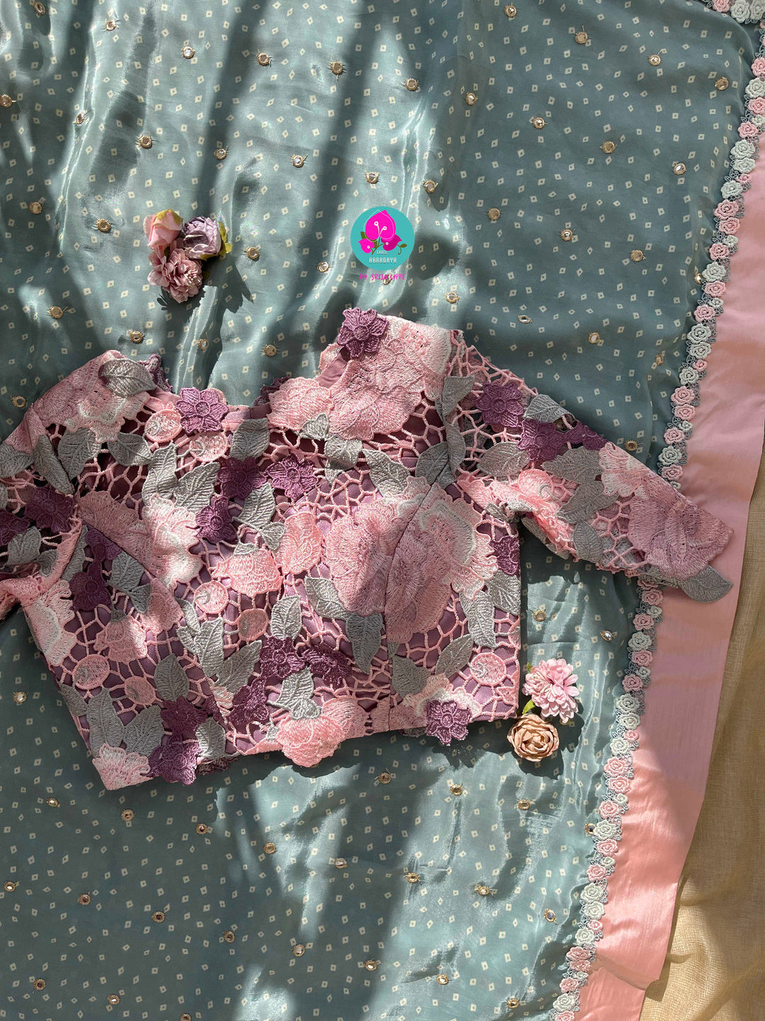 Pure Natural Crape Saree with Mirror Work and Rosy Floral border Paired with blouse