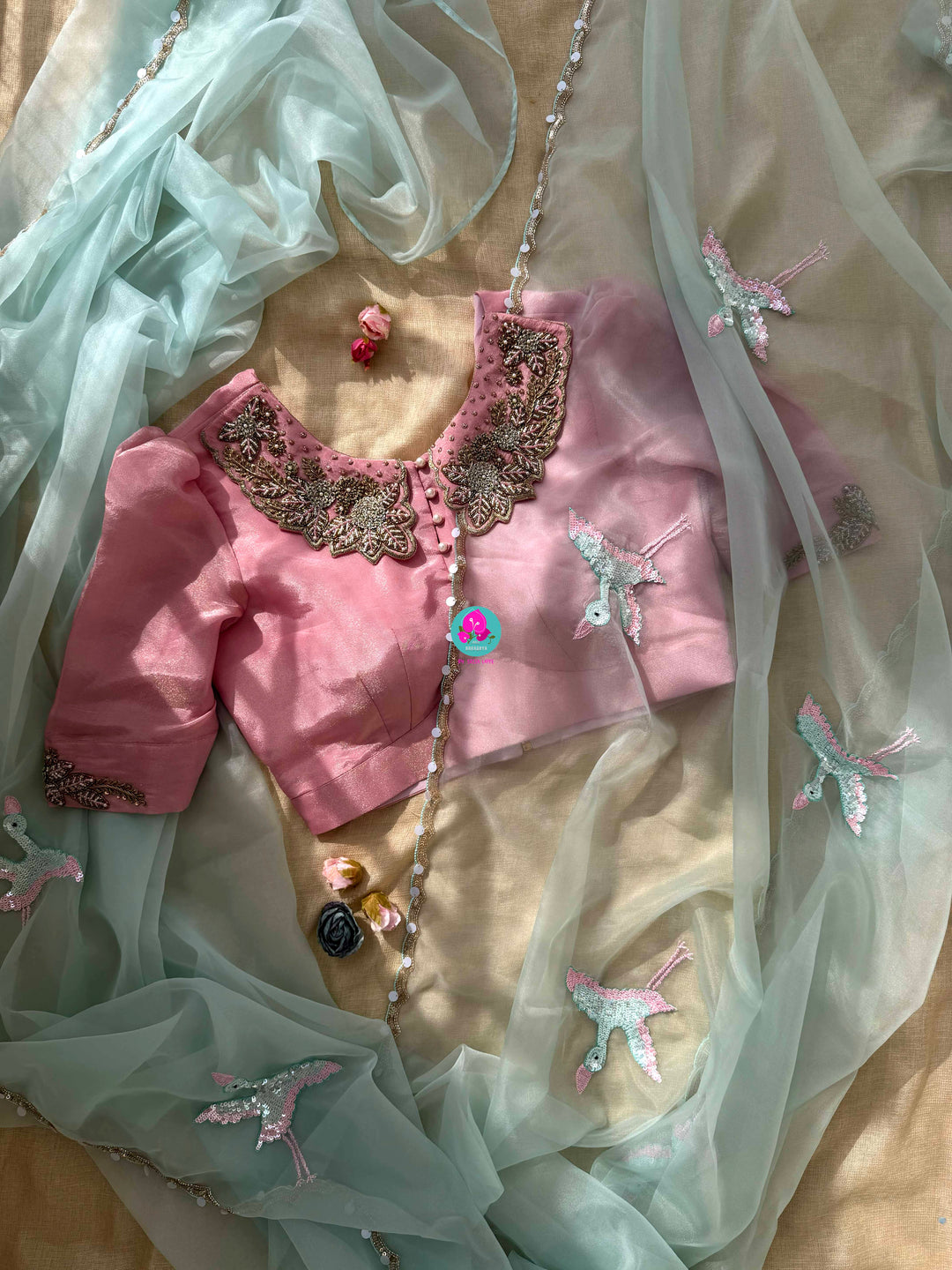 Featherlight Fantasy: Aqua Organza Saree with Embroidered Birds and Sequin Bloom