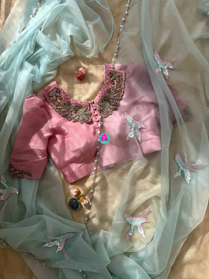 Featherlight Fantasy: Aqua Organza Saree with Embroidered Birds and Sequin Bloom