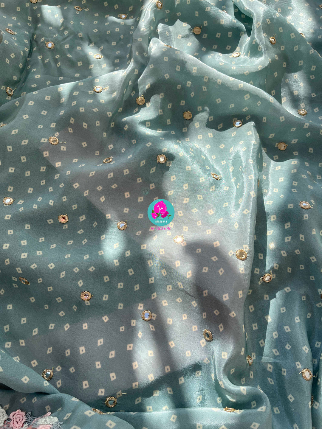 Pure Natural Crape Saree with Mirror Work and Rosy Floral border Paired with blouse