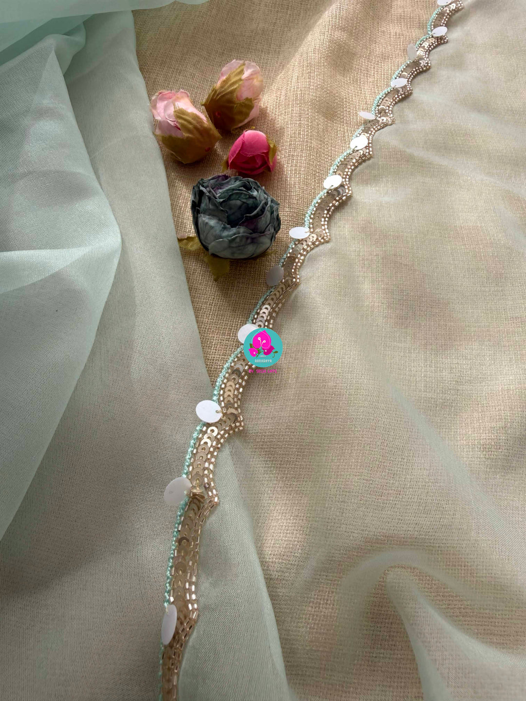 Featherlight Fantasy: Aqua Organza Saree with Embroidered Birds and Sequin Bloom