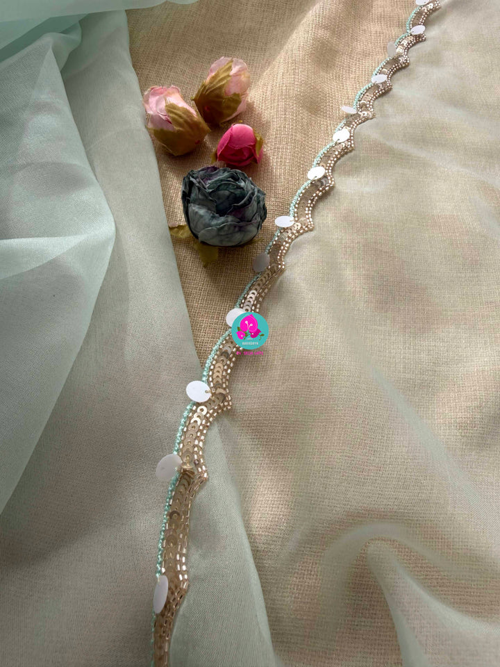 Featherlight Fantasy: Aqua Organza Saree with Embroidered Birds and Sequin Bloom