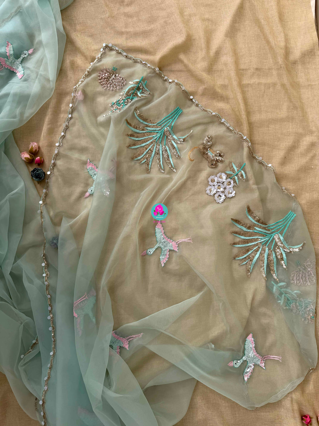 Featherlight Fantasy: Aqua Organza Saree with Embroidered Birds and Sequin Bloom