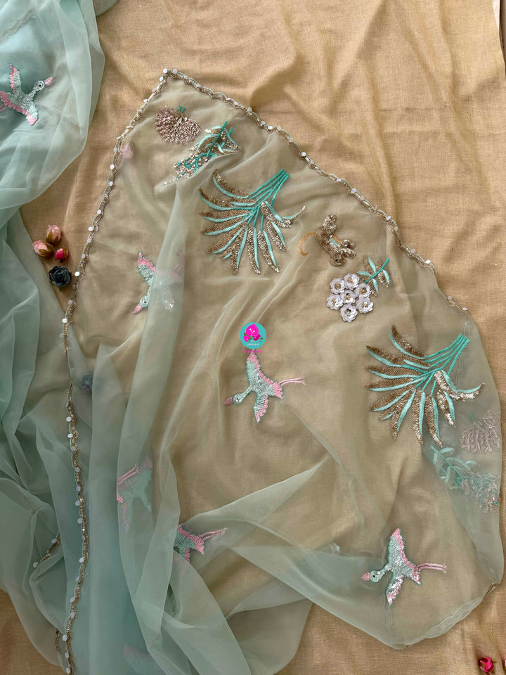 Featherlight Fantasy: Aqua Organza Saree with Embroidered Birds and Sequin Bloom