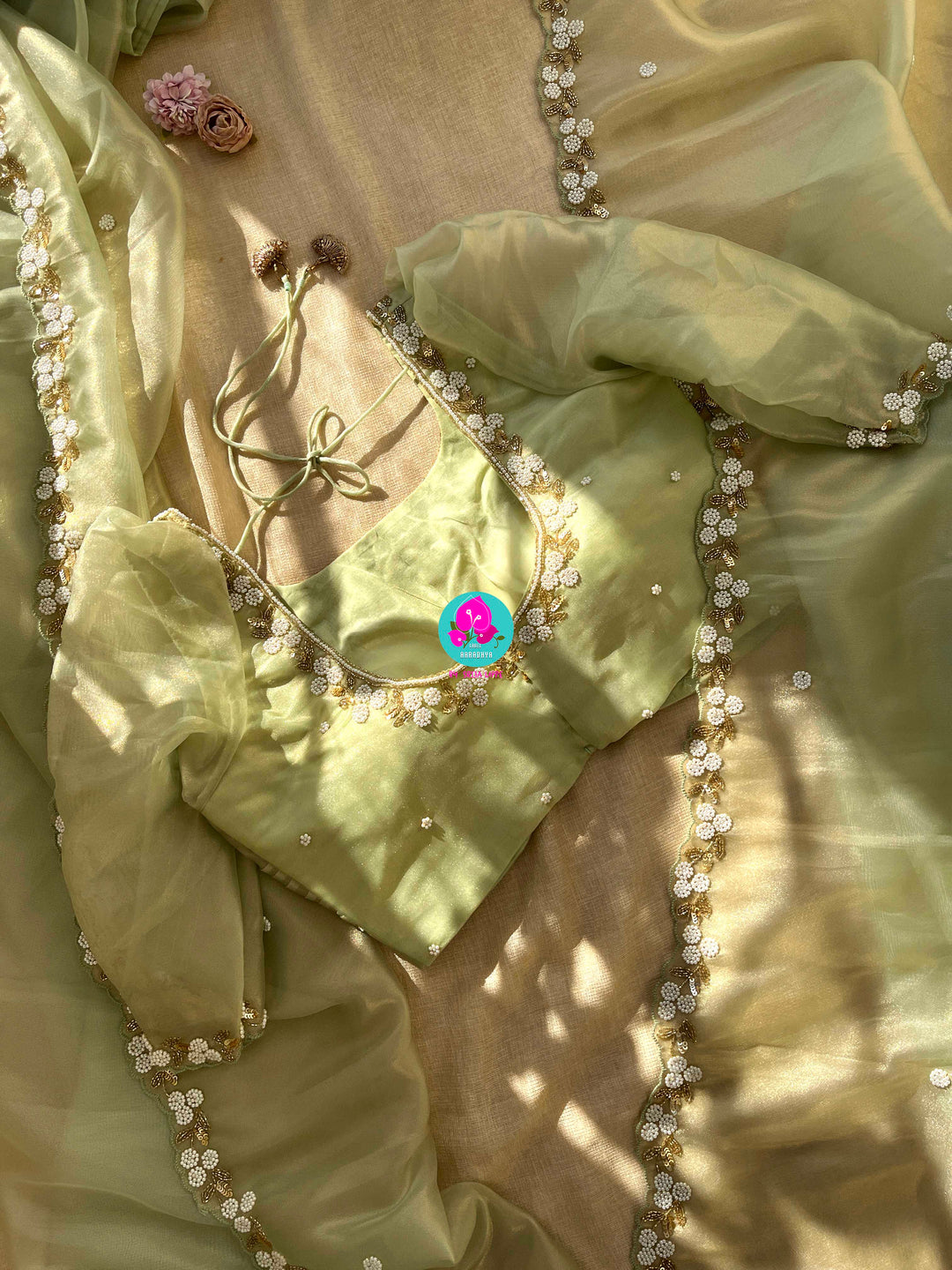 Garden of Grace: Flowy Organza Saree with Delicate Floral Beadwork