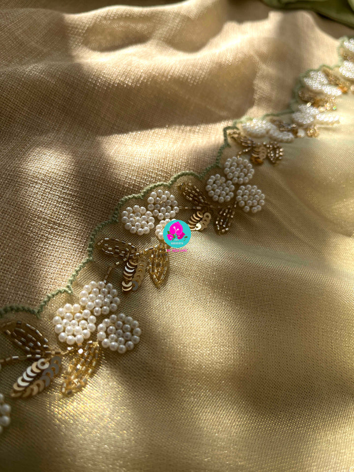 Garden of Grace: Flowy Organza Saree with Delicate Floral Beadwork