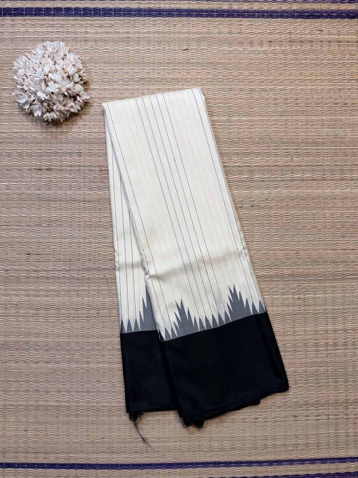 The Sannajaji Whisper: Zero Zari Kanjivaram in White and Black