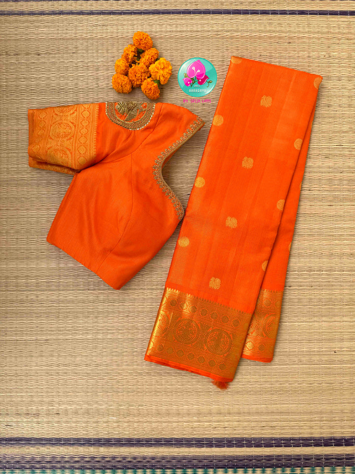 Radiant Solar Crest: Orange Vaira Oosi Kanchipattu Saree with Hand-Embroidered Gandaberunda Art