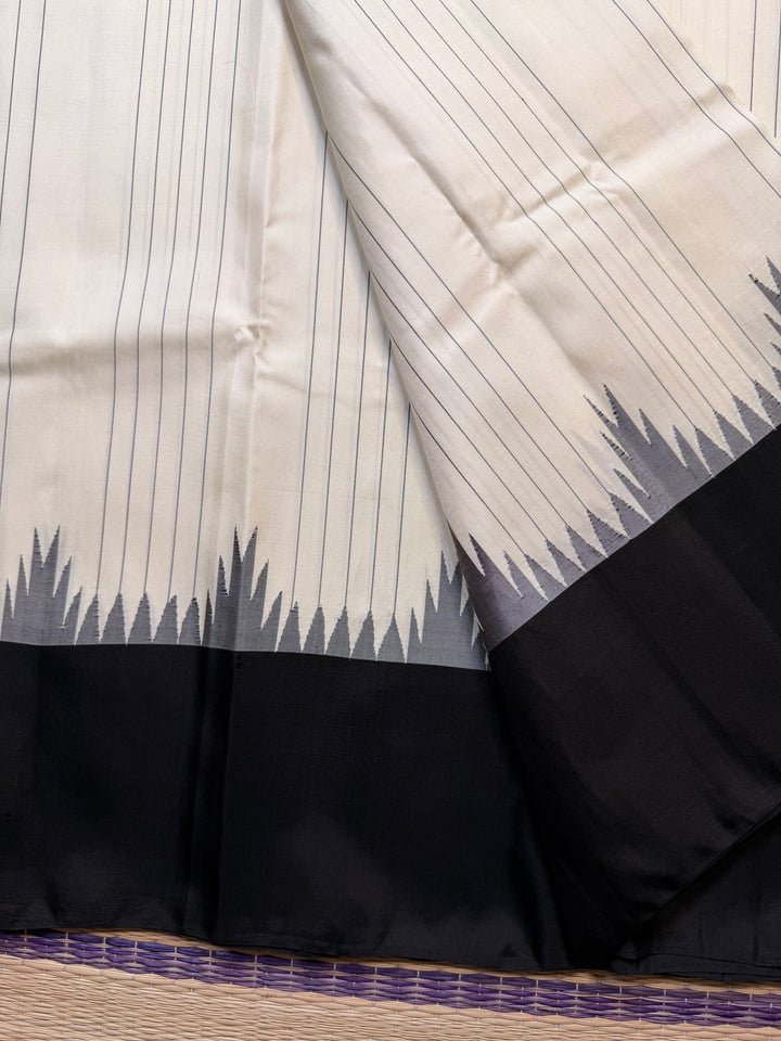 The Sannajaji Whisper: Zero Zari Kanjivaram in White and Black