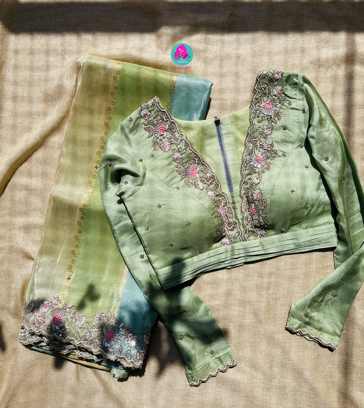 Pure tissue tussar georgette saree with hand embroidery paired with Hand embroidery blouse