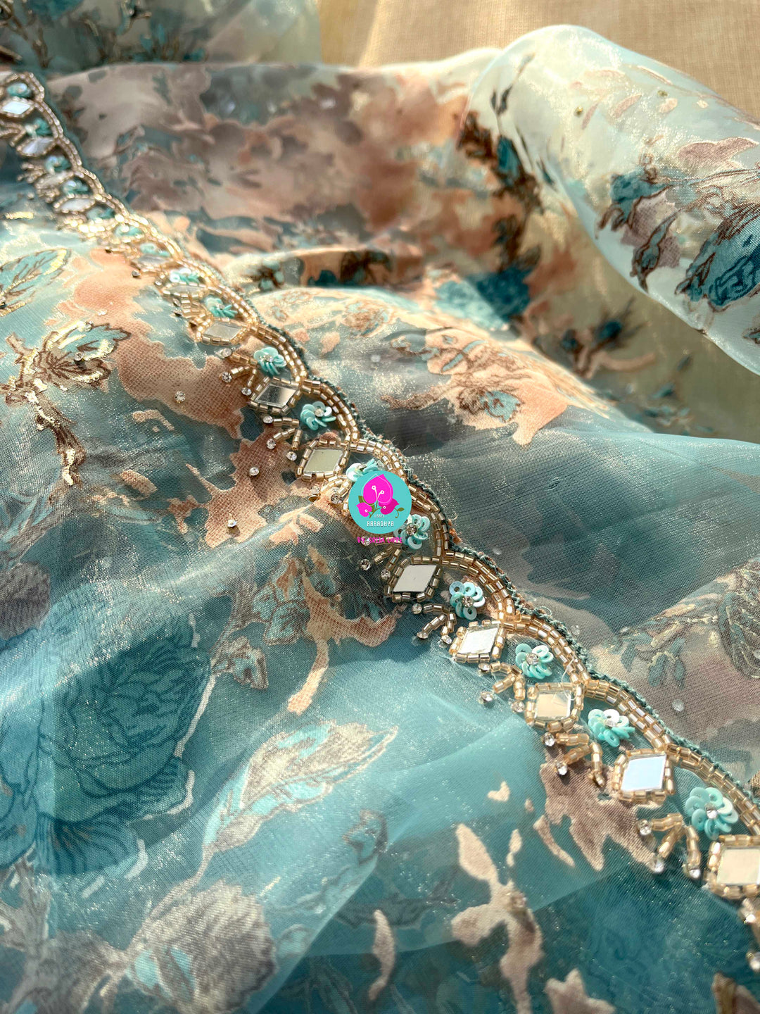 Aqua Serenity: Brasso Organza Saree with Mirror Work Magic