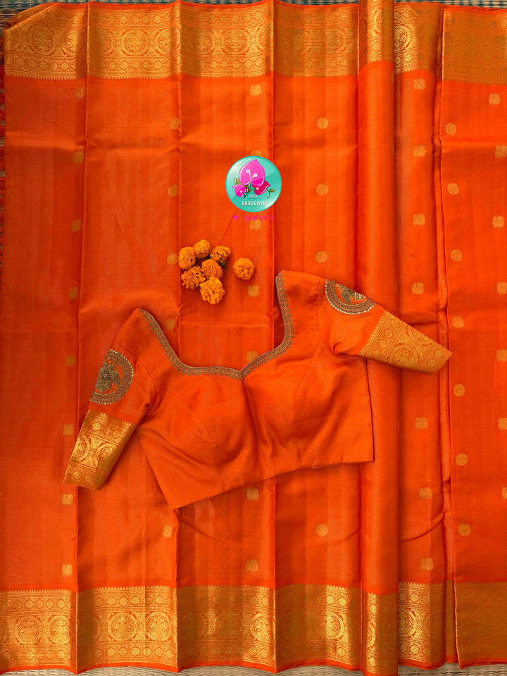 Radiant Solar Crest: Orange Vaira Oosi Kanchipattu Saree with Hand-Embroidered Gandaberunda Art