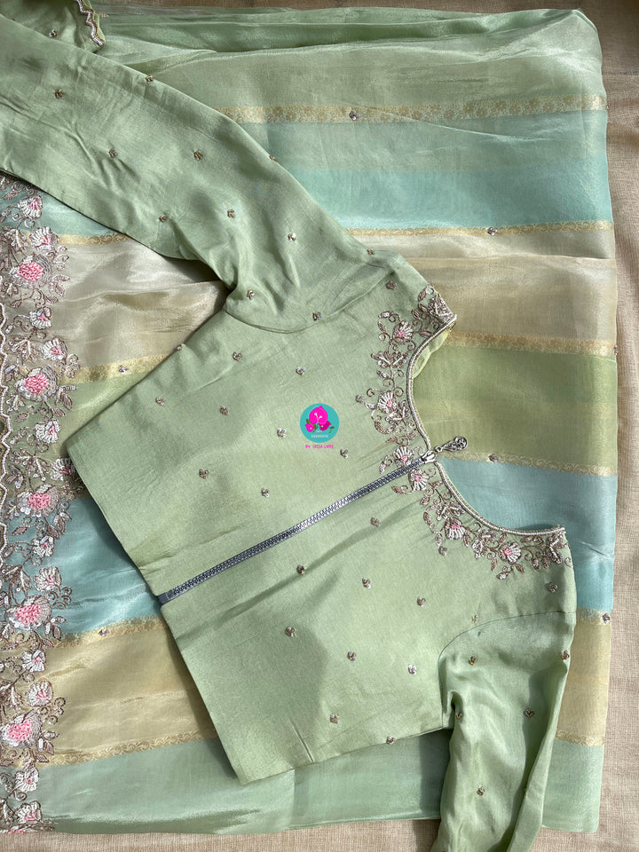 Pure tissue tussar georgette saree with hand embroidery paired with Hand embroidery blouse