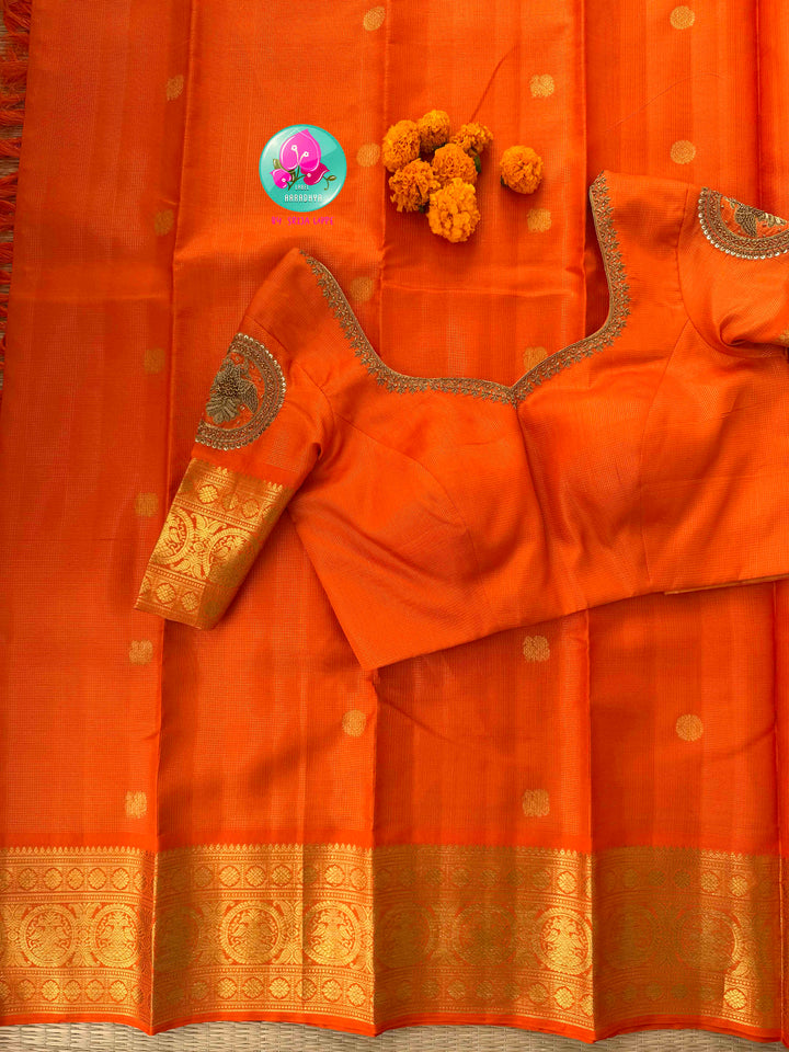 Radiant Solar Crest: Orange Vaira Oosi Kanchipattu Saree with Hand-Embroidered Gandaberunda Art