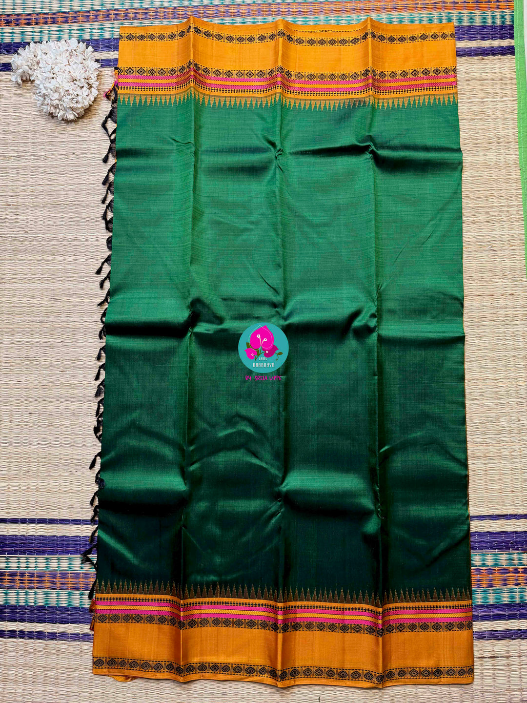 Minimalist Grandeur: Bottle Green Kanjivaram with Striking Mustard Contrast