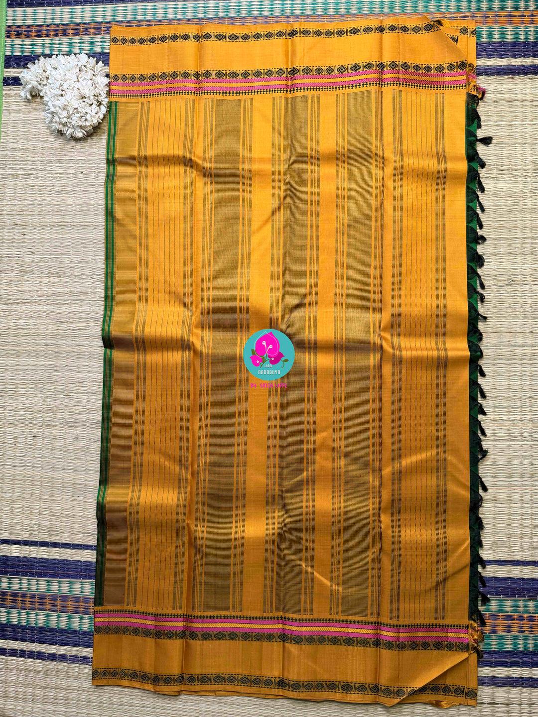 Minimalist Grandeur: Bottle Green Kanjivaram with Striking Mustard Contrast