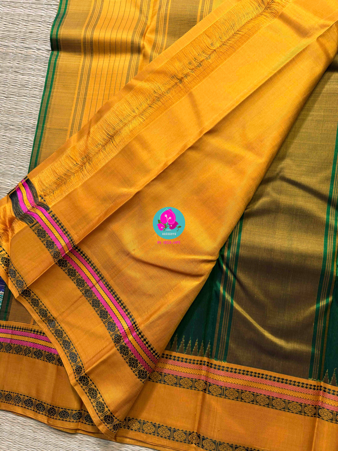 Minimalist Grandeur: Bottle Green Kanjivaram with Striking Mustard Contrast